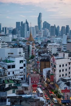 a view on Yaowarat Road in China Town with skyline in City of Bangkok in Thailand.  Thailand, Bangkok, November, 5, 2024.