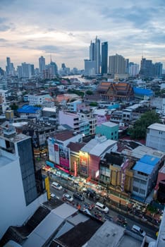 a view on Yaowarat Road in China Town with skyline in City of Bangkok in Thailand.  Thailand, Bangkok, November, 5, 2024.
