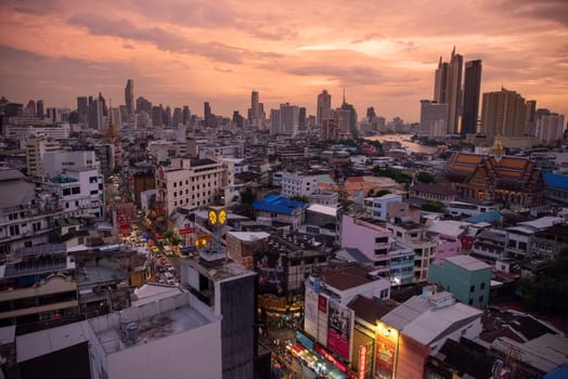 a view on Yaowarat Road in China Town with skyline in City of Bangkok in Thailand.  Thailand, Bangkok, November, 5, 2024.