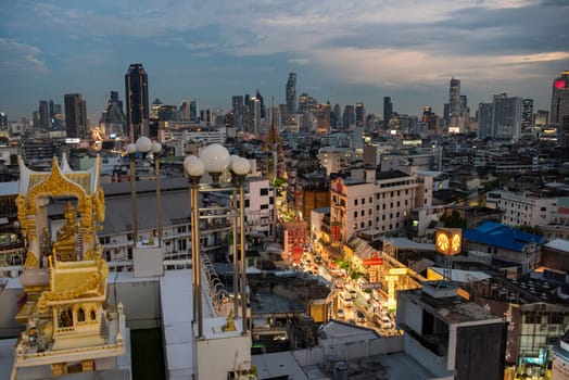 a view on Yaowarat Road in China Town with skyline in City of Bangkok in Thailand.  Thailand, Bangkok, November, 5, 2024.