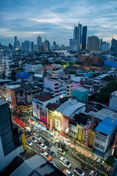 a view on Yaowarat Road in China Town with skyline in City of Bangkok in Thailand.  Thailand, Bangkok, November, 5, 2024.