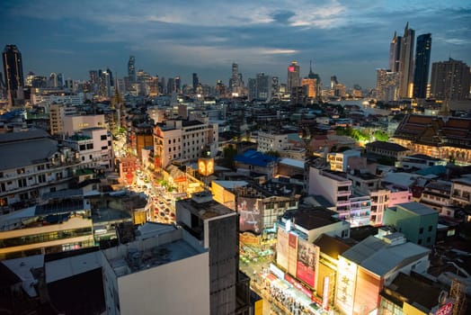 a view on Yaowarat Road in China Town with skyline in City of Bangkok in Thailand.  Thailand, Bangkok, November, 5, 2024.