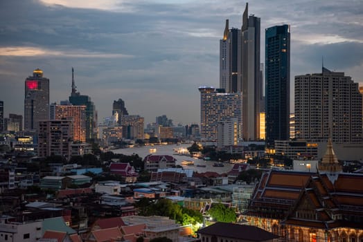 The skyline with Chao Phriya River in the City of Bangkok in Thailand.  Thailand, Bangkok, November, 5, 2024.
