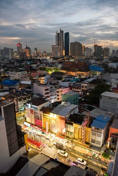 a view on Yaowarat Road in China Town with skyline in City of Bangkok in Thailand.  Thailand, Bangkok, November, 5, 2024.