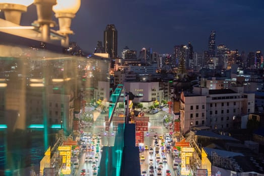 a view on Yaowarat Road in China Town with skyline in City of Bangkok in Thailand.  Thailand, Bangkok, November, 5, 2024.