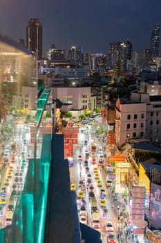 a view on Yaowarat Road in China Town with skyline in City of Bangkok in Thailand.  Thailand, Bangkok, November, 5, 2024.