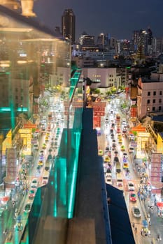 a view on Yaowarat Road in China Town with skyline in City of Bangkok in Thailand.  Thailand, Bangkok, November, 5, 2024.