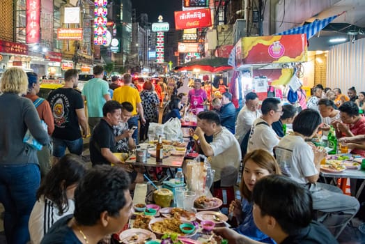People at Night Streetmarket on Yaowarat Road in Chinatown in City of Bangkok in Thailand.  Thailand, Bangkok, November, 5, 2024.