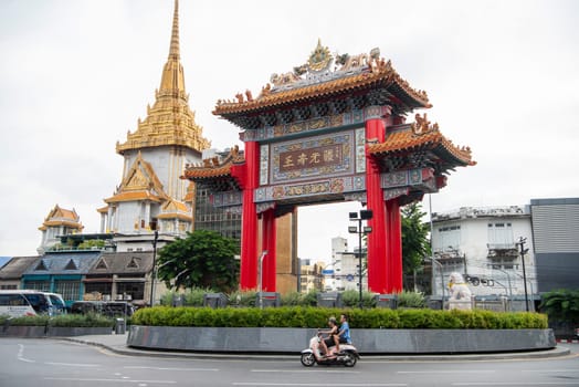 The Chinese Gate at Wat Traimit in Chinatown in the City of Bangkok in Thailand.  Thailand, Bangkok, November, 6, 2024.