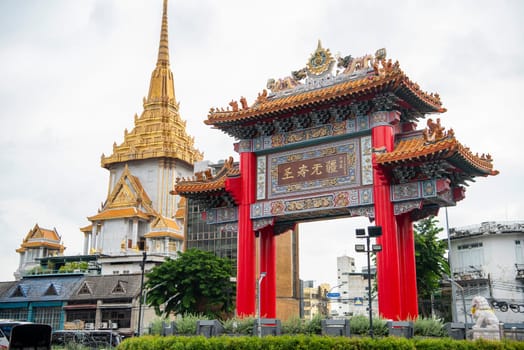 The Chinese Gate at Wat Traimit in Chinatown in the City of Bangkok in Thailand.  Thailand, Bangkok, November, 6, 2024.