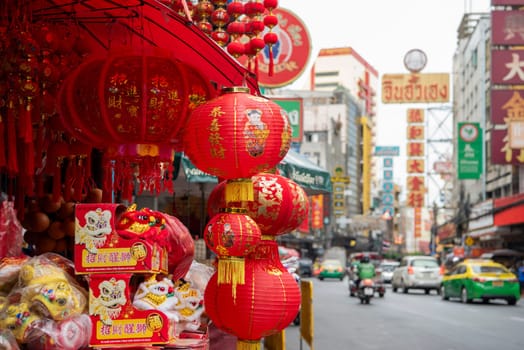 a Market street with shops in the China Town with skyline in the City of Bangkok in Thailand.  Thailand, Bangkok, November, 6, 2024.