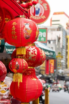 a Market street with shops in the China Town with skyline in the City of Bangkok in Thailand.  Thailand, Bangkok, November, 6, 2024.