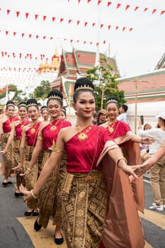 Traditional Thai Women at Opening Ceremony at Wat Saket Festival Fair in Bangkok in Thailand.  Thailand, Bangkok, November, 8, 2024.