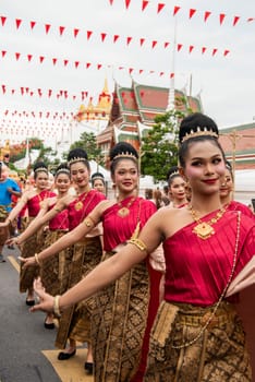 Traditional Thai Women at Opening Ceremony at Wat Saket Festival Fair in Bangkok in Thailand.  Thailand, Bangkok, November, 8, 2024.