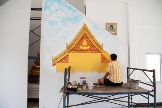 a Artist Painter at the Wat Phlapphla Chai in City of Bangkok in Thailand.  Thailand, Bangkok, November, 6, 2024.