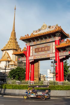 The Chinese Gate at Wat Traimit in Chinatown in the City of Bangkok in Thailand.  Thailand, Bangkok, November, 6, 2024.