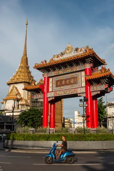 The Chinese Gate at Wat Traimit in Chinatown in the City of Bangkok in Thailand.  Thailand, Bangkok, November, 6, 2024.