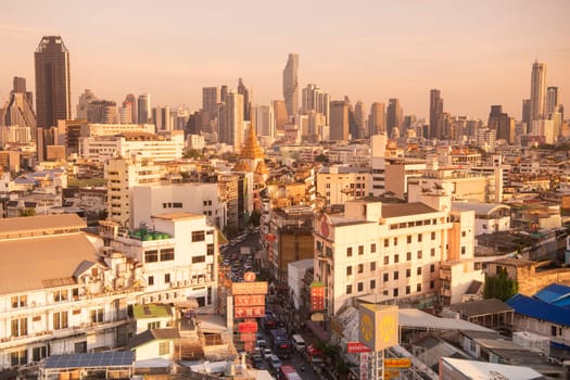 a view on Yaowarat Road in China Town with skyline in City of Bangkok in Thailand.  Thailand, Bangkok, November, 6, 2024.