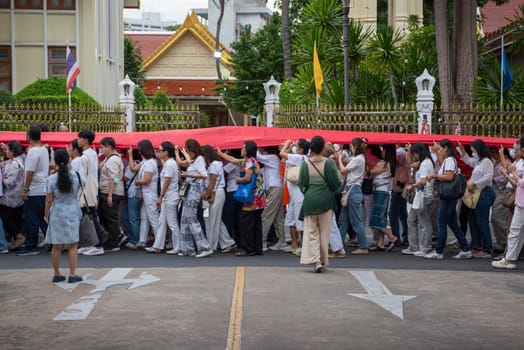 Ceremony on the way to Golden Mount at Wat Saket Festival Fair in Bangkok in Thailand.  Thailand, Bangkok, November, 8, 2024.