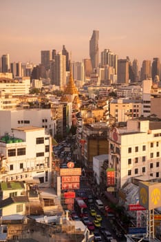 a view on Yaowarat Road in China Town with skyline in City of Bangkok in Thailand.  Thailand, Bangkok, November, 6, 2024.