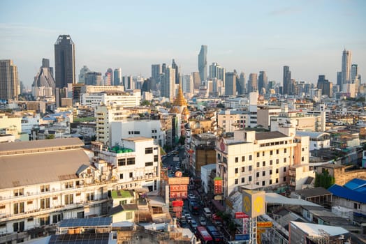 a view on Yaowarat Road in China Town with skyline in City of Bangkok in Thailand.  Thailand, Bangkok, November, 6, 2024.