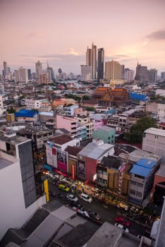 a view on Yaowarat Road in China Town with skyline in City of Bangkok in Thailand.  Thailand, Bangkok, November, 6, 2024.