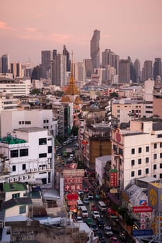 a view on Yaowarat Road in China Town with skyline in City of Bangkok in Thailand.  Thailand, Bangkok, November, 6, 2024.