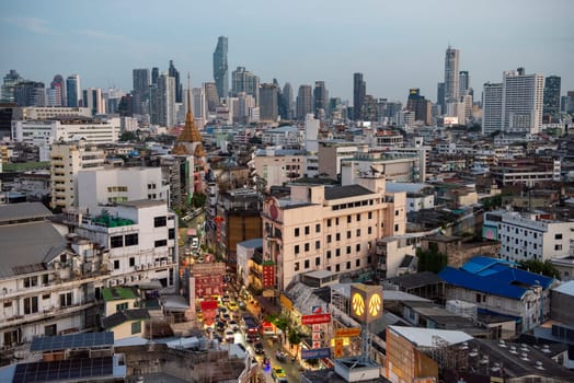 a view on Yaowarat Road in China Town with skyline in City of Bangkok in Thailand.  Thailand, Bangkok, November, 6, 2024.