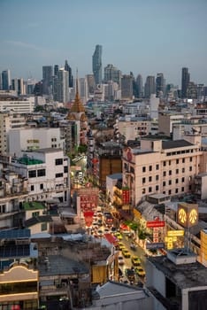 a view on Yaowarat Road in China Town with skyline in City of Bangkok in Thailand.  Thailand, Bangkok, November, 6, 2024.