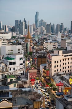 a view on Yaowarat Road in China Town with skyline in City of Bangkok in Thailand.  Thailand, Bangkok, November, 6, 2024.