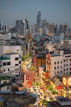 a view on Yaowarat Road in China Town with skyline in City of Bangkok in Thailand.  Thailand, Bangkok, November, 6, 2024.