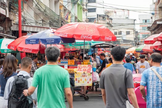 a street with shops and Market the China Town with skyline in the City of Bangkok in Thailand.  Thailand, Bangkok, Dezember, 14, 2024.