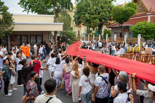 Ceremony on the way to Golden Mount at Wat Saket Festival Fair in Bangkok in Thailand.  Thailand, Bangkok, November, 8, 2024.
