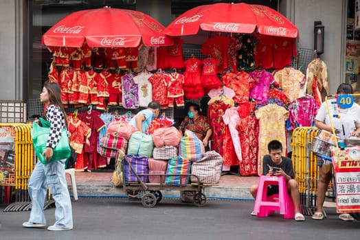 a street with shops and Market the China Town with skyline in the City of Bangkok in Thailand.  Thailand, Bangkok, Dezember, 14, 2024.