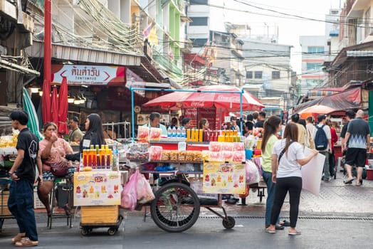 a street with shops and Market the China Town with skyline in the City of Bangkok in Thailand.  Thailand, Bangkok, Dezember, 14, 2024.