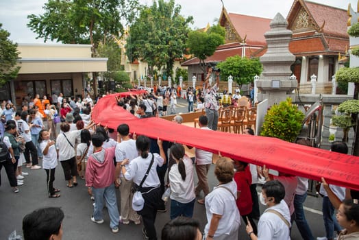 Ceremony on the way to Golden Mount at Wat Saket Festival Fair in Bangkok in Thailand.  Thailand, Bangkok, November, 8, 2024.