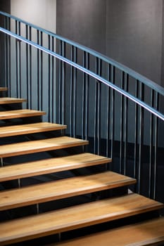 Wooden staircase and metal railing