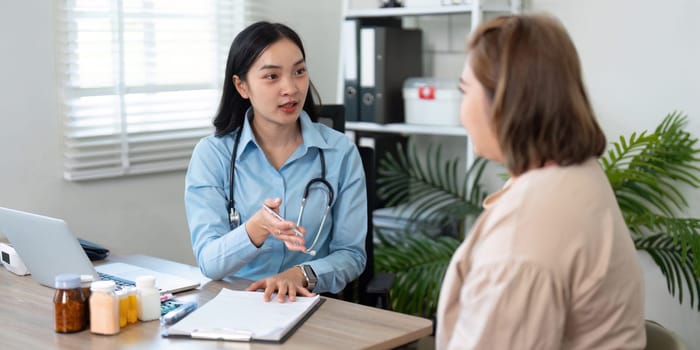 A general practitioner provides guidance and support to a patient, ensuring clear communication and understanding during the consultation.