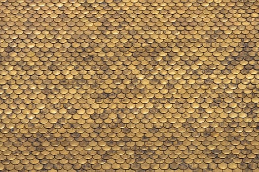 Abstract pattern with golden roof tiles