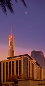 UAE, Dubai, 19 September 2024: architecture of the city at sunset, skyscrapers with glass facades. High quality photo