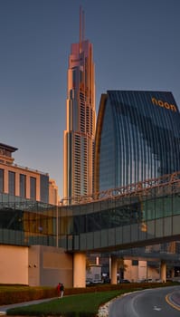 UAE, Dubai, 19 September 2024: architecture of the city at sunset, skyscrapers with glass facades. High quality photo