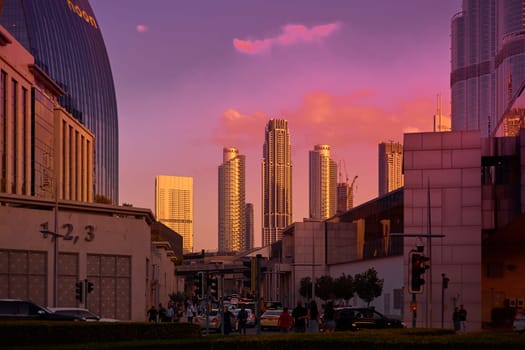 UAE, Dubai, 19 September 2024: architecture of the city at sunset, skyscrapers with glass facades. High quality photo