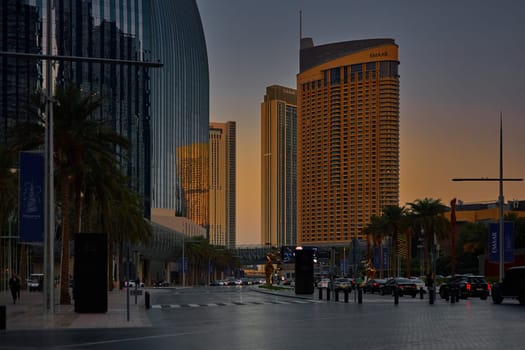 UAE, Dubai, 19 September 2024: architecture of the city at sunset, skyscrapers with glass facades. High quality photo