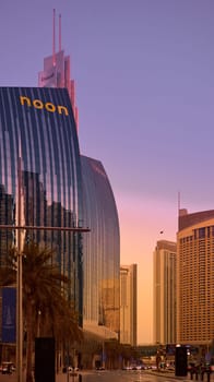 UAE, Dubai, 19 September 2024: architecture of the city at sunset, skyscrapers with glass facades. High quality photo
