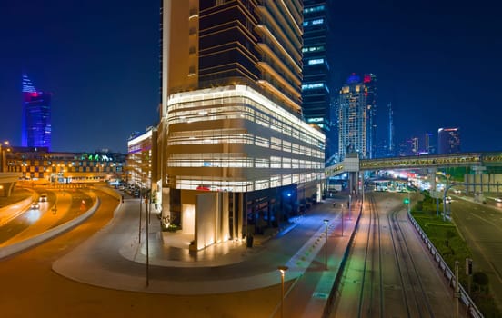 UAE, Dubai, 19 September 2024: architecture of the city at sunset, skyscrapers with glass facades. High quality photo