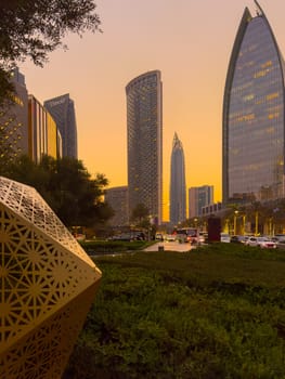 UAE, Dubai, 19 September 2024: architecture of the city at sunset, skyscrapers with glass facades. High quality photo