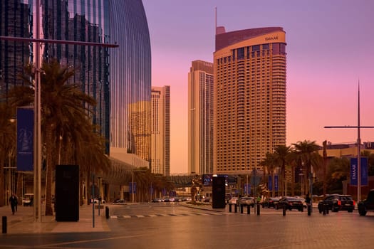 UAE, Dubai, 19 September 2024: architecture of the city at sunset, skyscrapers with glass facades. High quality photo