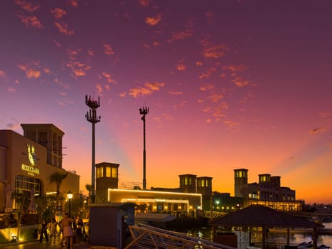 UAE, Dubai, 19 September 2024: architecture of the city at sunset, skyscrapers with glass facades. High quality photo