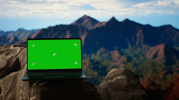Remote wilderness escape featuring rocky peaks with green screen and lush greenery. This picturesque landscape is a paradise for nature lovers and trekking enthusiasts searching for solitude.