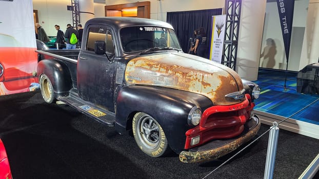 Toronto, ON Canada - 02.19.2023: Classic Chevrolet Pickup Truck with Patina, Displayed at a Vintage Car Exhibition Event.